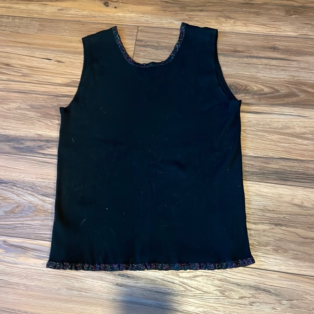 Vintage black with red and green around collar. Large women’s sleeveless top.